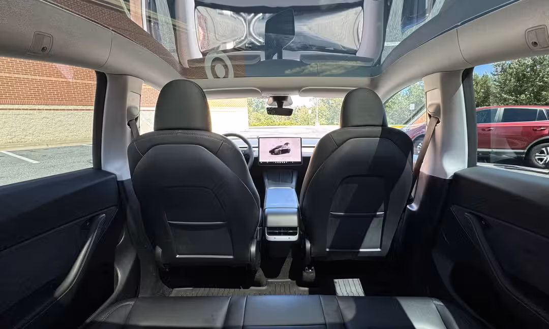 2023 Tesla Model Y Long Range AWD in Solid Black — Panoramic Roof