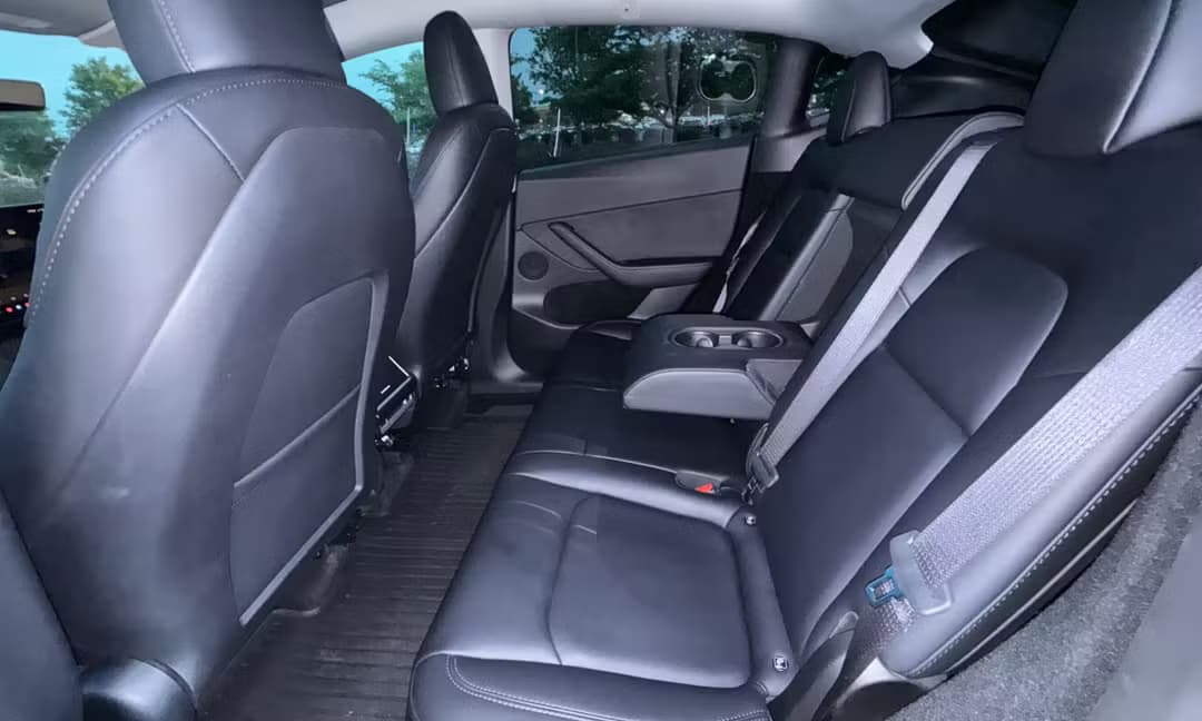 2023 Tesla Model Y Long Range AWD in Solid Black — Rear Seats