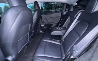 2023 Tesla Model Y Long Range AWD in Solid Black — Rear Seats
